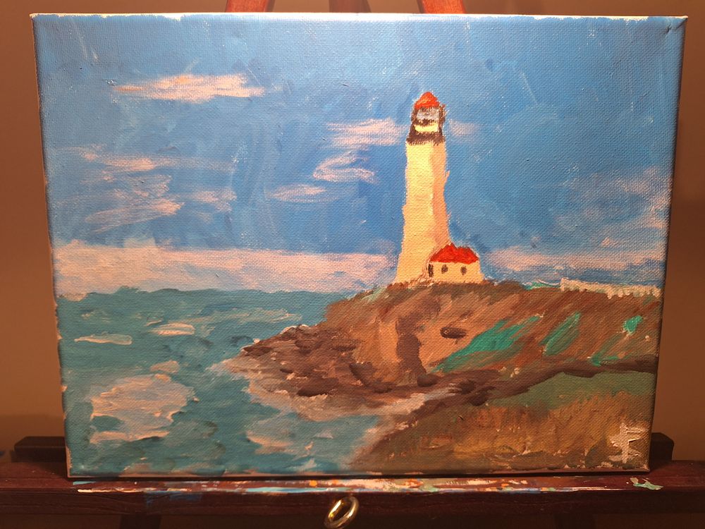Lighthouse on Rocky Shore